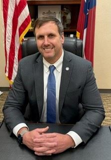 Commissioner Michael Smith